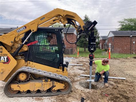 skid steer helical pile driver|helical drive head installation.